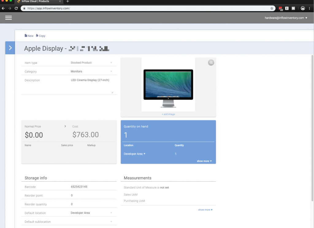 Screenshot of the inFlow Inventory web app being used for asset tracking with an Apple Cinema display